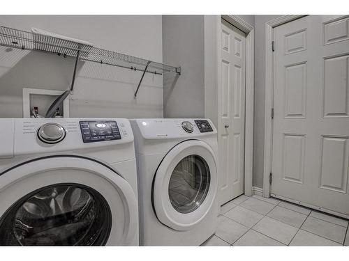 284 Everbrook Way Sw, Calgary, AB - Indoor Photo Showing Laundry Room