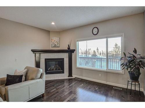 284 Everbrook Way Sw, Calgary, AB - Indoor With Fireplace