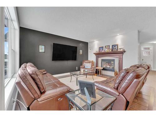 50 Sage Hill Way Nw, Calgary, AB - Indoor Photo Showing Living Room With Fireplace