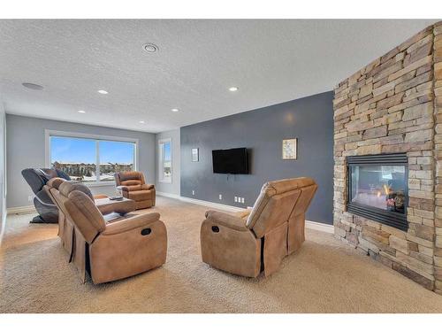 50 Sage Hill Way Nw, Calgary, AB - Indoor Photo Showing Living Room With Fireplace