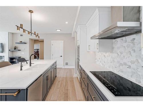 409-15 Cougar Ridge Landing Sw, Calgary, AB - Indoor Photo Showing Kitchen With Upgraded Kitchen