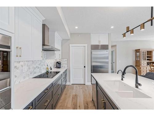 409-15 Cougar Ridge Landing Sw, Calgary, AB - Indoor Photo Showing Kitchen With Upgraded Kitchen