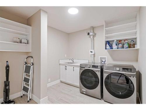 409-15 Cougar Ridge Landing Sw, Calgary, AB - Indoor Photo Showing Laundry Room