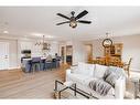 409-15 Cougar Ridge Landing Sw, Calgary, AB  - Indoor Photo Showing Living Room 