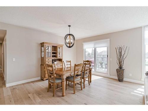 409-15 Cougar Ridge Landing Sw, Calgary, AB - Indoor Photo Showing Dining Room