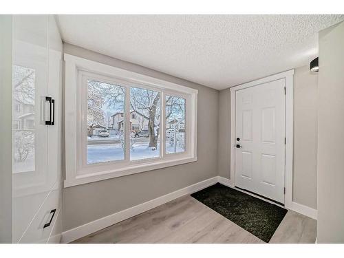 7435 20A Street Se, Calgary, AB - Indoor Photo Showing Other Room