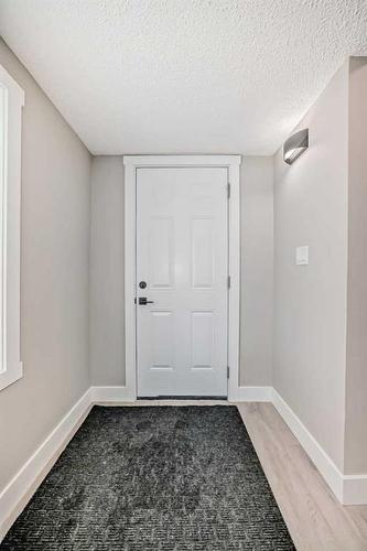 7435 20A Street Se, Calgary, AB - Indoor Photo Showing Other Room