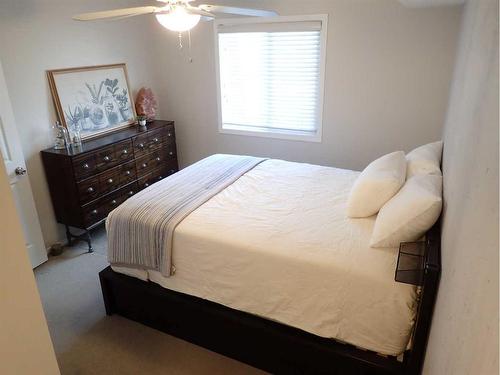 107-6315 Ranchview Drive Nw, Calgary, AB - Indoor Photo Showing Bedroom