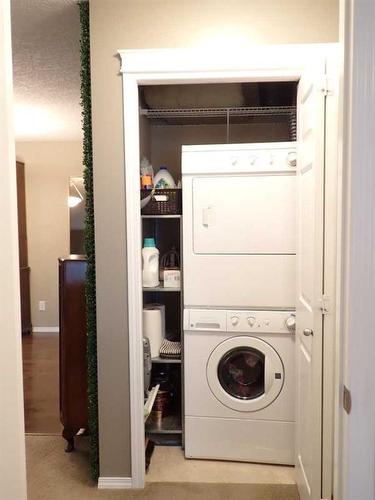 107-6315 Ranchview Drive Nw, Calgary, AB - Indoor Photo Showing Laundry Room