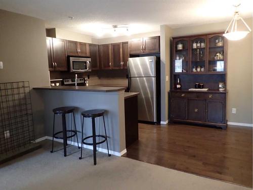 107-6315 Ranchview Drive Nw, Calgary, AB - Indoor Photo Showing Kitchen