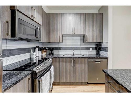 5-4 Sage Hill Terrace Nw, Calgary, AB - Indoor Photo Showing Kitchen With Double Sink