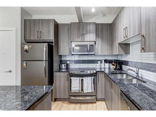 5-4 Sage Hill Terrace Nw, Calgary, AB - Indoor Photo Showing Kitchen With Double Sink