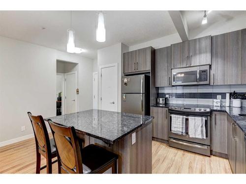 5-4 Sage Hill Terrace Nw, Calgary, AB - Indoor Photo Showing Kitchen With Upgraded Kitchen