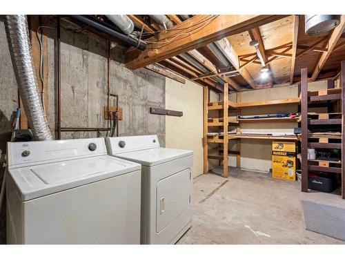 11 Cedarwood Rise Sw, Calgary, AB - Indoor Photo Showing Laundry Room