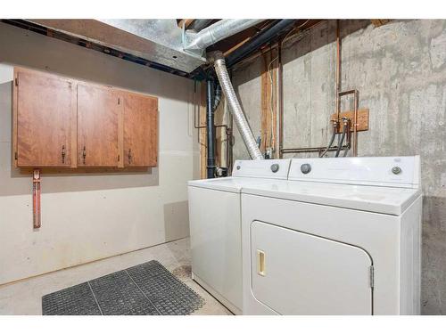 11 Cedarwood Rise Sw, Calgary, AB - Indoor Photo Showing Laundry Room