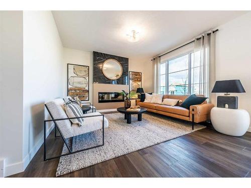 196 Lewiston Drive Ne, Calgary, AB - Indoor Photo Showing Living Room With Fireplace