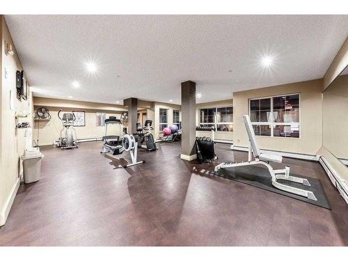 320-5115 Richard Road Sw, Calgary, AB - Indoor Photo Showing Gym Room