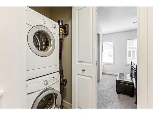 324 Silverado Common Sw, Calgary, AB - Indoor Photo Showing Laundry Room