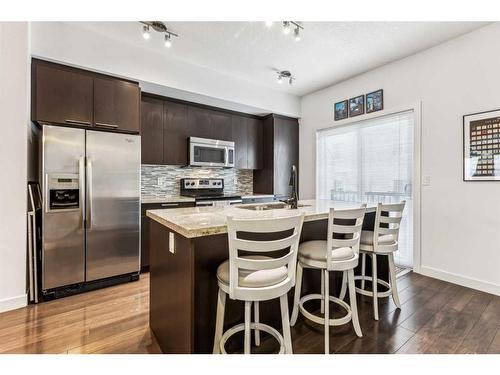 324 Silverado Common Sw, Calgary, AB - Indoor Photo Showing Kitchen With Upgraded Kitchen