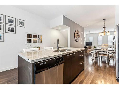 324 Silverado Common Sw, Calgary, AB - Indoor Photo Showing Kitchen With Double Sink