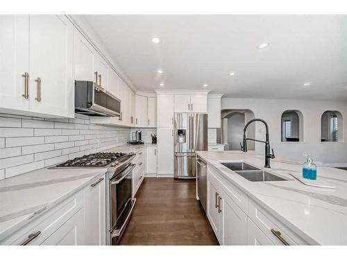 248 Tuscany Ravine View Nw, Calgary, AB - Indoor Photo Showing Kitchen With Stainless Steel Kitchen With Double Sink With Upgraded Kitchen