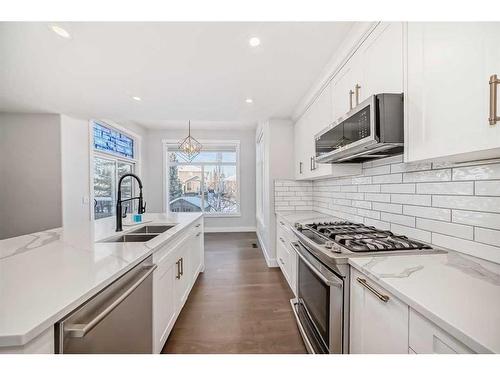 248 Tuscany Ravine View Nw, Calgary, AB - Indoor Photo Showing Kitchen With Double Sink With Upgraded Kitchen