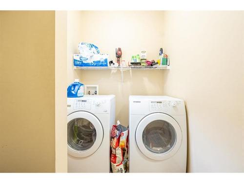 229 West Creek Boulevard, Chestermere, AB - Indoor Photo Showing Laundry Room