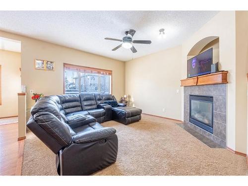 229 West Creek Boulevard, Chestermere, AB - Indoor Photo Showing Living Room With Fireplace