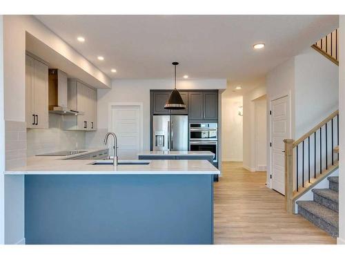 88 Ranchers View East, Okotoks, AB - Indoor Photo Showing Kitchen With Stainless Steel Kitchen With Upgraded Kitchen