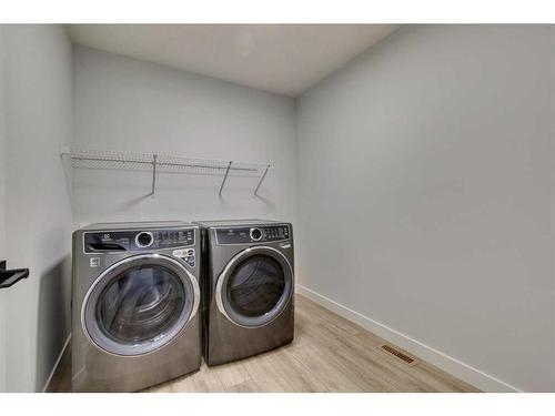 88 Ranchers View East, Okotoks, AB - Indoor Photo Showing Laundry Room