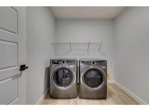 88 Ranchers View East, Okotoks, AB - Indoor Photo Showing Laundry Room