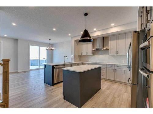 88 Ranchers View East, Okotoks, AB - Indoor Photo Showing Kitchen With Stainless Steel Kitchen With Upgraded Kitchen