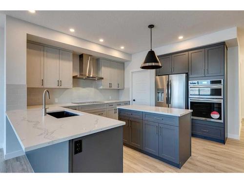 88 Ranchers View East, Okotoks, AB - Indoor Photo Showing Kitchen With Stainless Steel Kitchen With Upgraded Kitchen