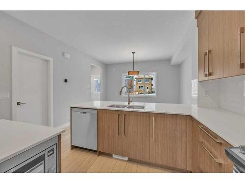 584 Dawson Drive, Chestermere, AB - Indoor Photo Showing Kitchen With Double Sink