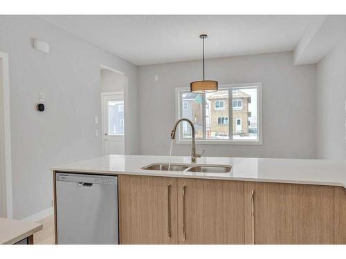 584 Dawson Drive, Chestermere, AB - Indoor Photo Showing Kitchen With Double Sink