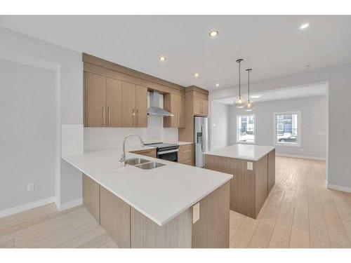 584 Dawson Drive, Chestermere, AB - Indoor Photo Showing Kitchen With Stainless Steel Kitchen With Double Sink With Upgraded Kitchen