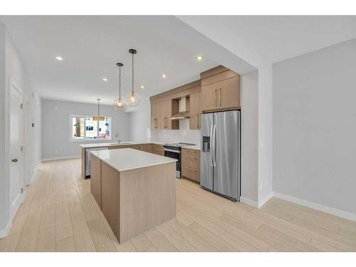 584 Dawson Drive, Chestermere, AB - Indoor Photo Showing Kitchen With Stainless Steel Kitchen