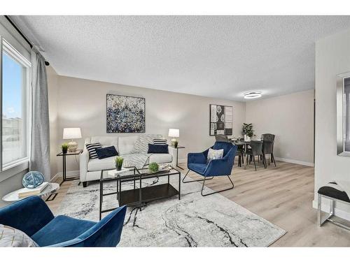 86 Abalone Crescent Ne, Calgary, AB - Indoor Photo Showing Living Room