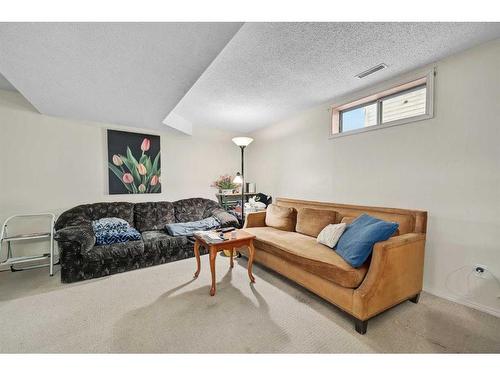 86 Abalone Crescent Ne, Calgary, AB - Indoor Photo Showing Living Room