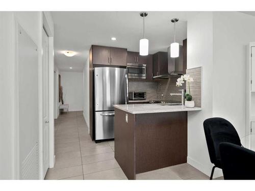 511-303 13 Avenue Sw, Calgary, AB - Indoor Photo Showing Kitchen With Stainless Steel Kitchen With Upgraded Kitchen