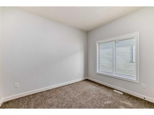 488 Rivercrest View, Cochrane, AB - Indoor Photo Showing Other Room