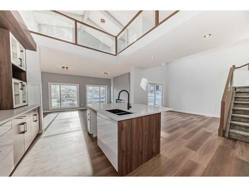 488 Rivercrest View, Cochrane, AB - Indoor Photo Showing Kitchen With Double Sink