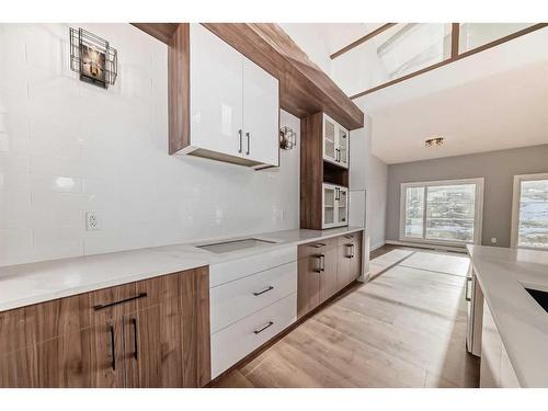 488 Rivercrest View, Cochrane, AB - Indoor Photo Showing Kitchen