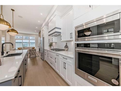 1112B Regent Crescent Ne, Calgary, AB - Indoor Photo Showing Kitchen With Double Sink With Upgraded Kitchen