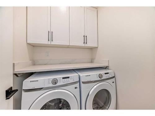 1112B Regent Crescent Ne, Calgary, AB - Indoor Photo Showing Laundry Room