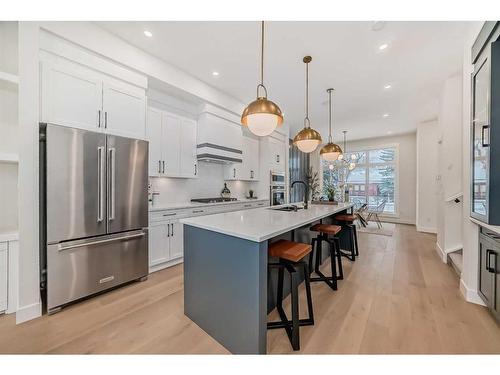 1112B Regent Crescent Ne, Calgary, AB - Indoor Photo Showing Kitchen With Stainless Steel Kitchen With Upgraded Kitchen