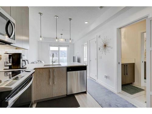 1332-76 Cornerstone Passage Ne, Calgary, AB - Indoor Photo Showing Kitchen With Stainless Steel Kitchen