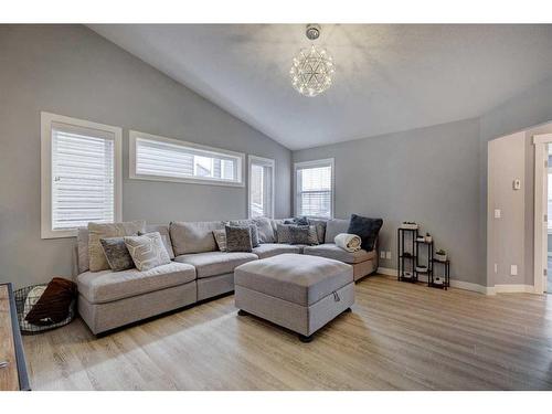 28 Crestbrook Way Sw, Calgary, AB - Indoor Photo Showing Living Room