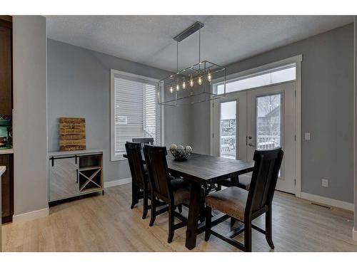 28 Crestbrook Way Sw, Calgary, AB - Indoor Photo Showing Dining Room