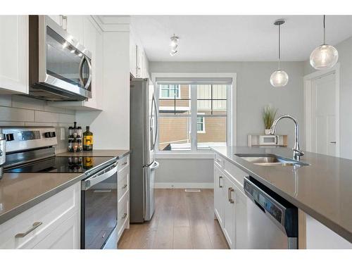 867 Cranston Avenue Se, Calgary, AB - Indoor Photo Showing Kitchen With Upgraded Kitchen